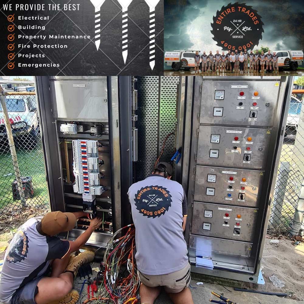 Two Men Are Working On A Large Electrical Box — Entire Trades in Central Coast, NSW