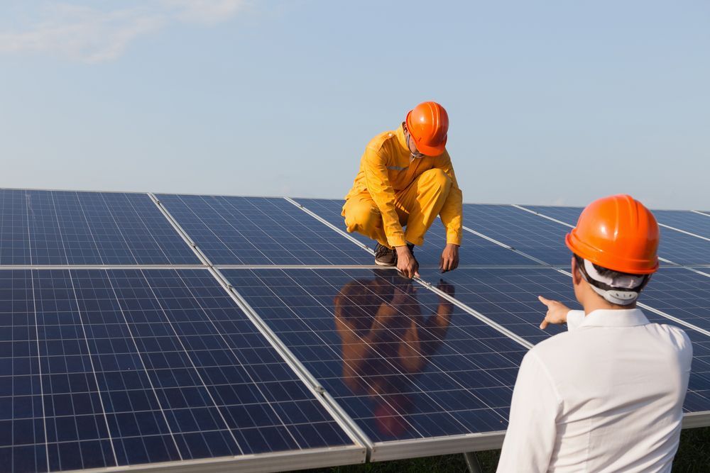 Electrician Installing Solar Panels — Entire Trades in Maitland, NSW