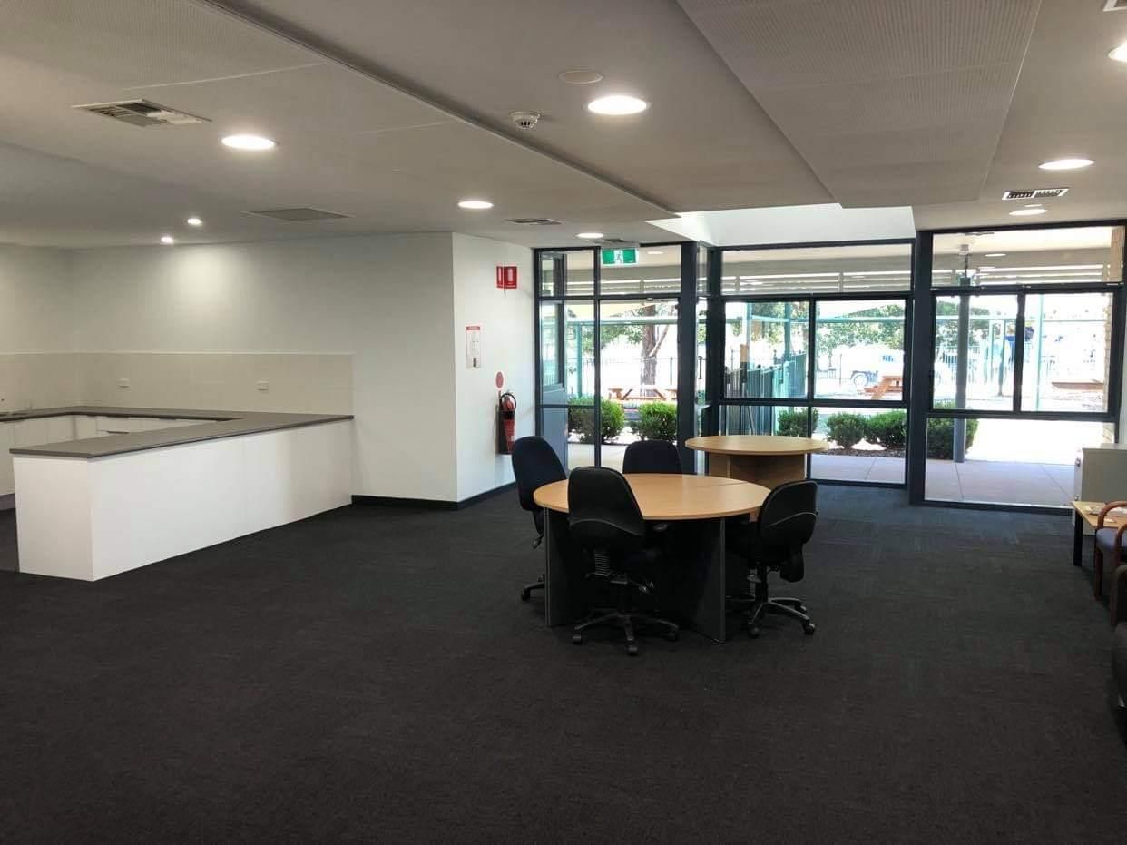 A Room with A Table and Chairs in It — Entire Trades in Maitland, NSW