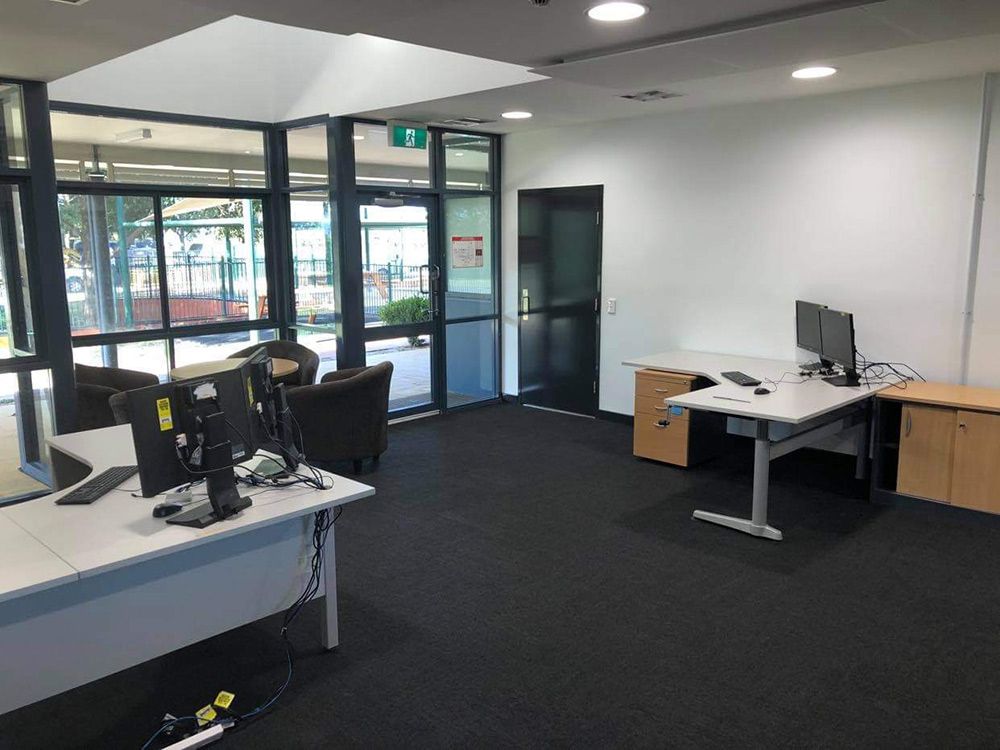 Newly Renovate Office Setting With Two Workstations And A Computer — Entire Trades in Port Stephens, NSW
