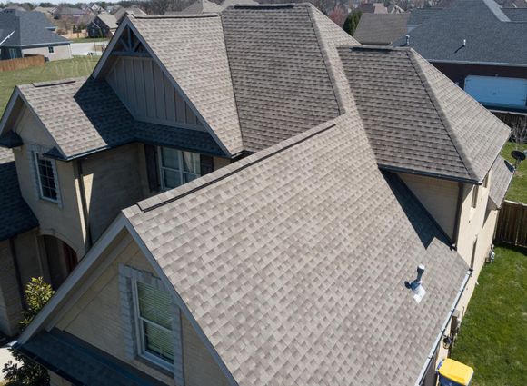 residential shingle roof using ridge vent