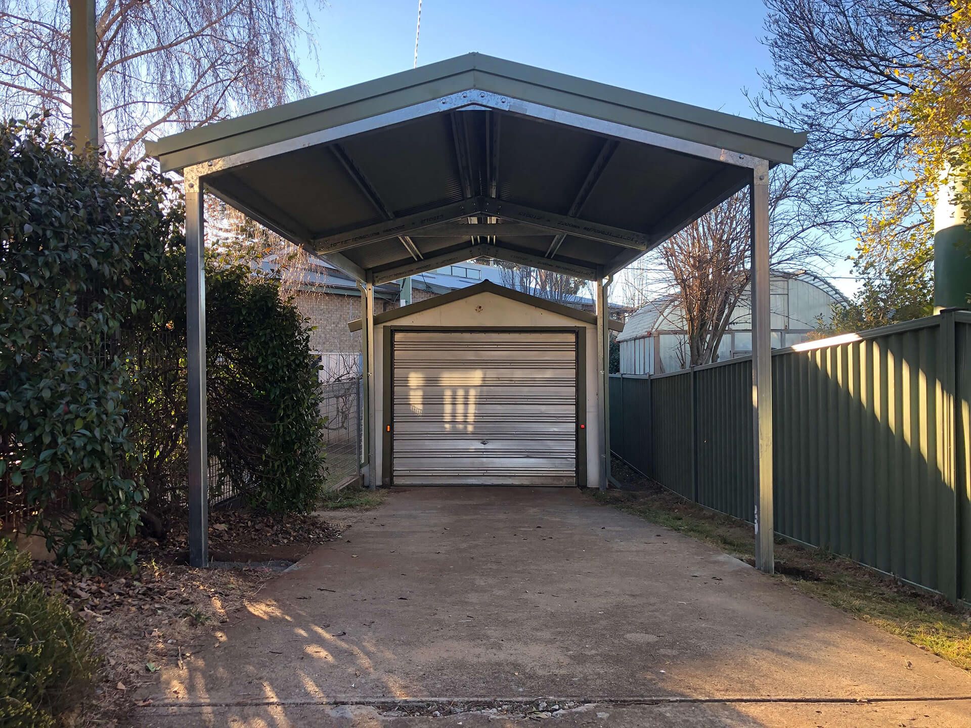 Flat roof Carport attached to house - Snowy Sheds