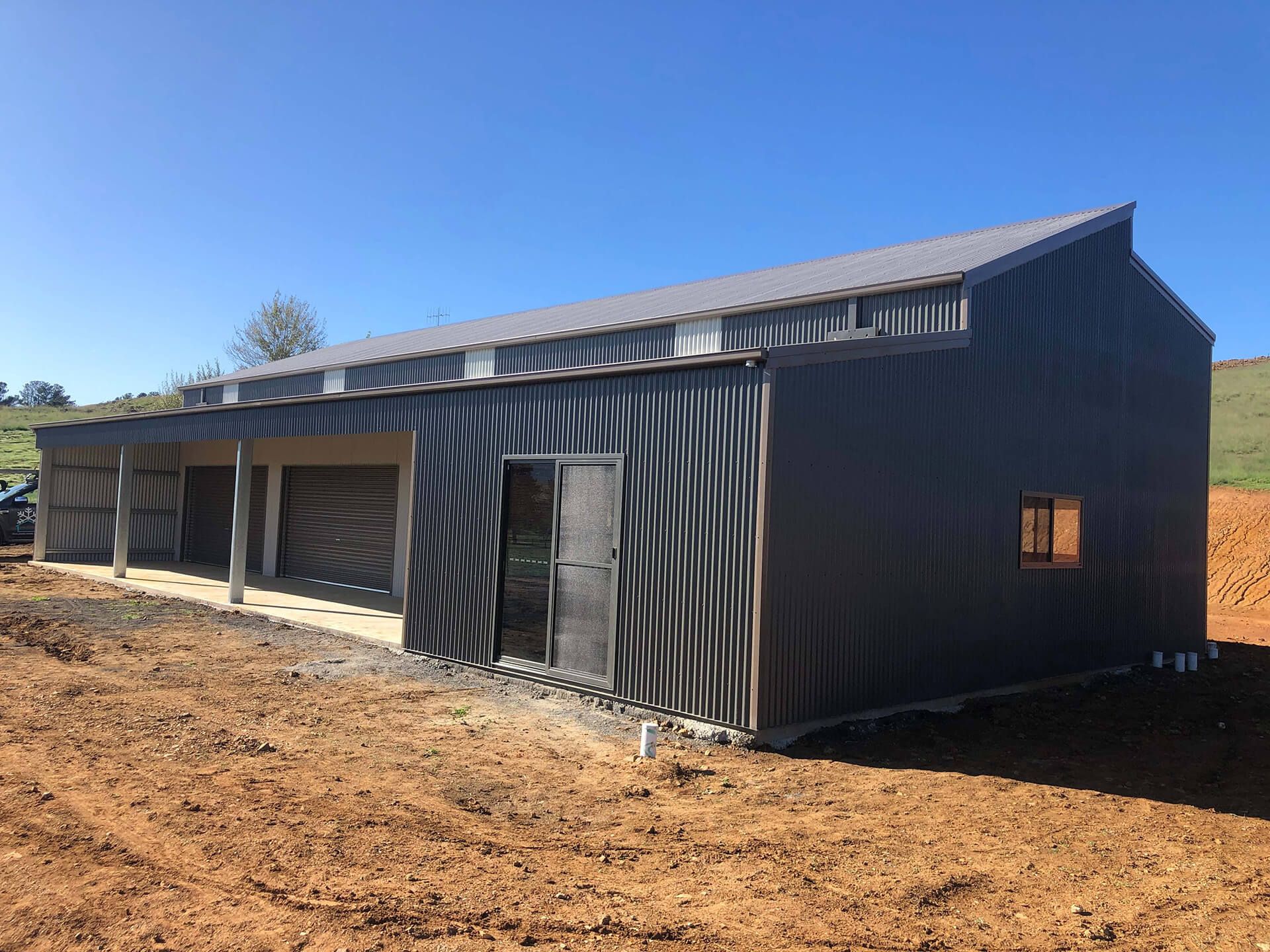 Black 3 door American style barn shed