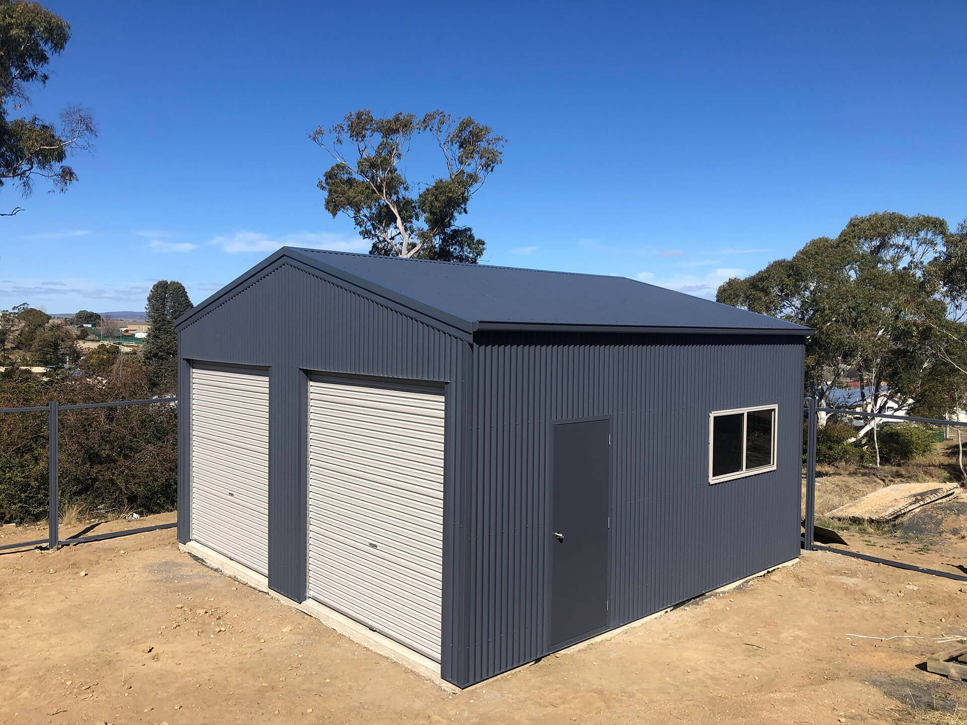 black 2 door shed with cream doors - Snowy Sheds