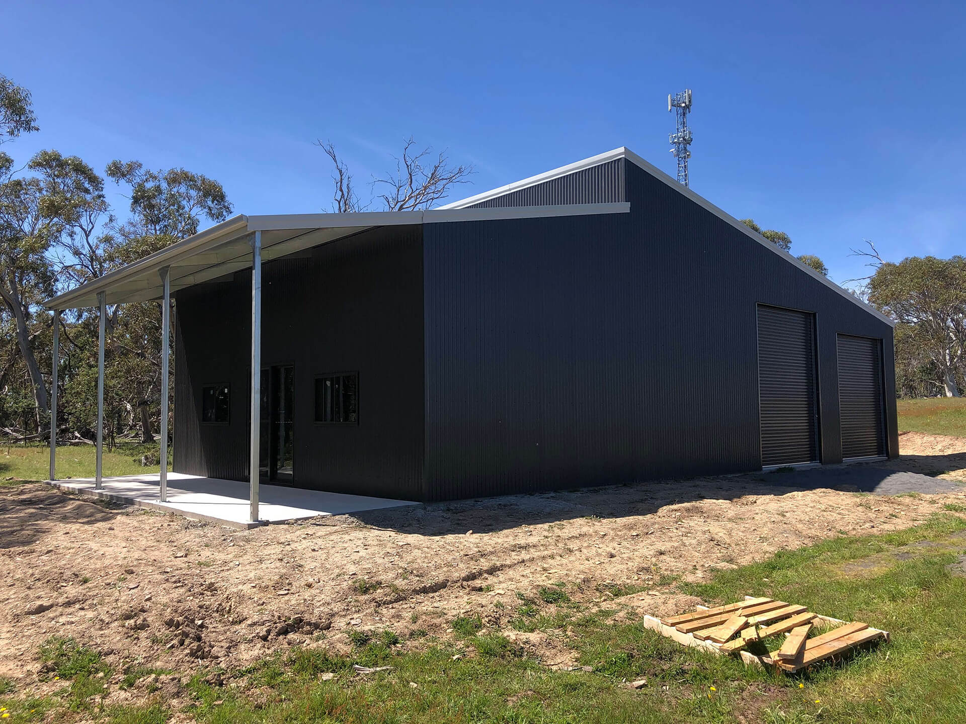 Industrial Steel black Shed side-back view - Snowy Sheds