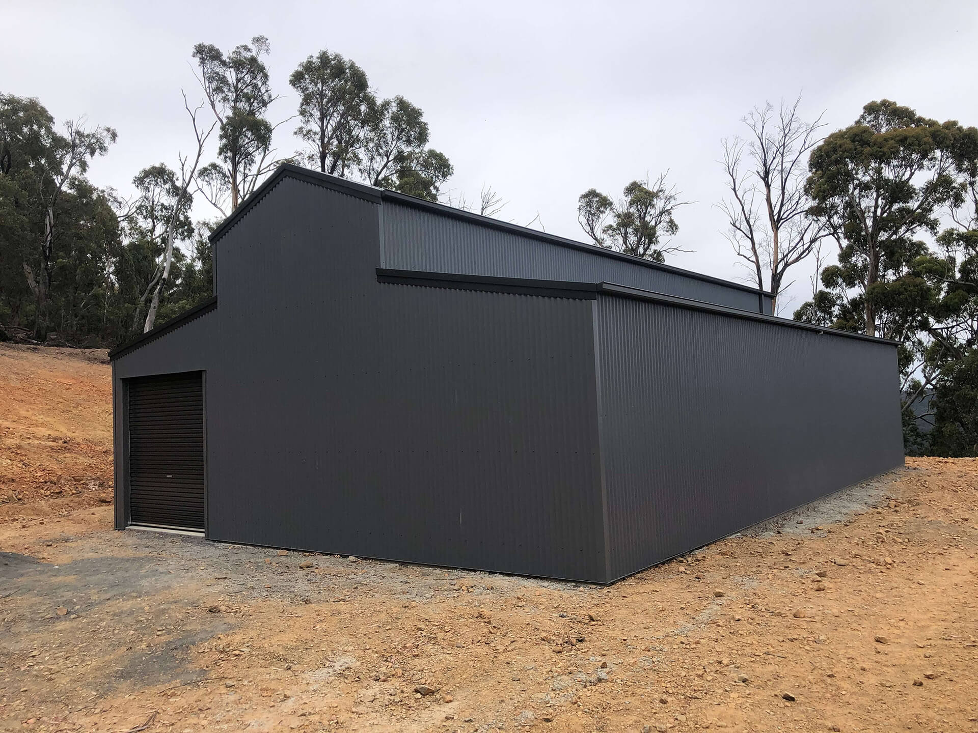 Black 1 door American style barn shed back