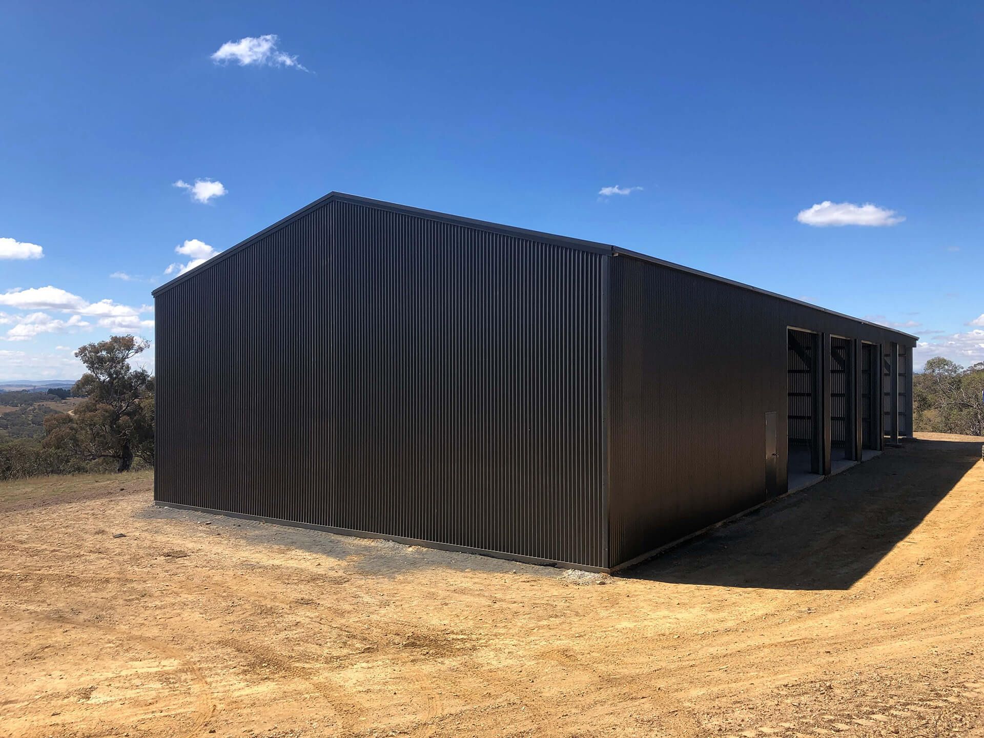 Industrial Steel black Shed back - Snowy Sheds