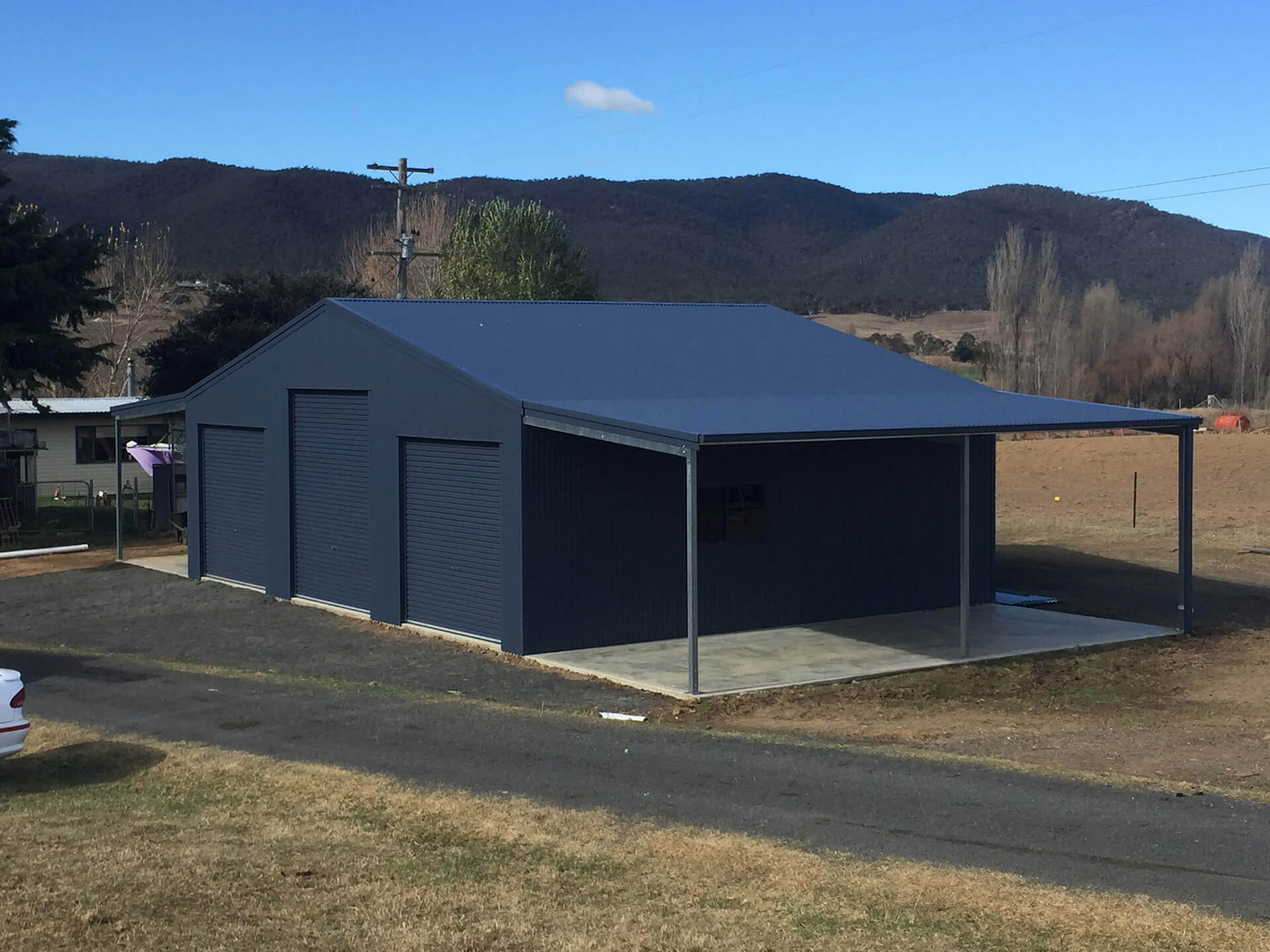 Industrial Steel black Shed with carport - Snowy Sheds