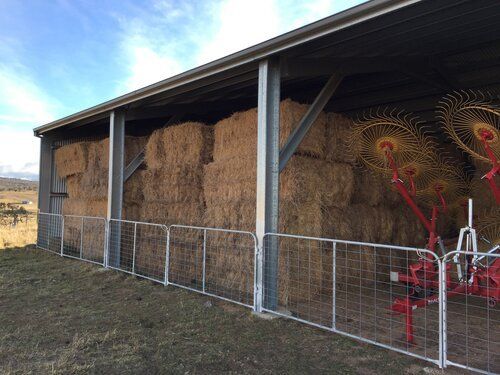 Large open farm shed with hay bales - Snowy Sheds