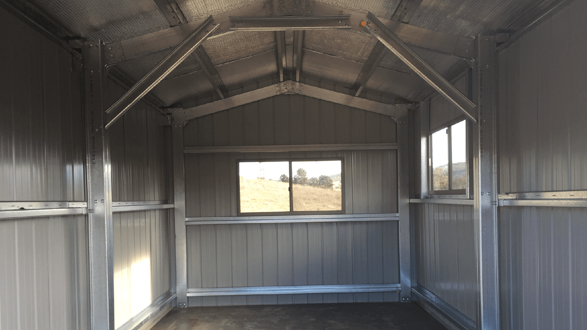 Industrial white shed interior - Snowy Sheds