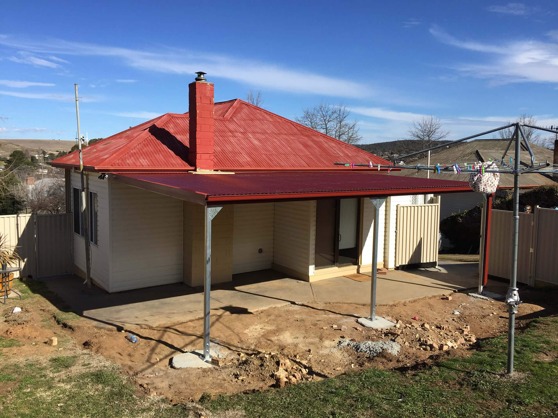 Flat roof Carport attached to house - Snowy Sheds