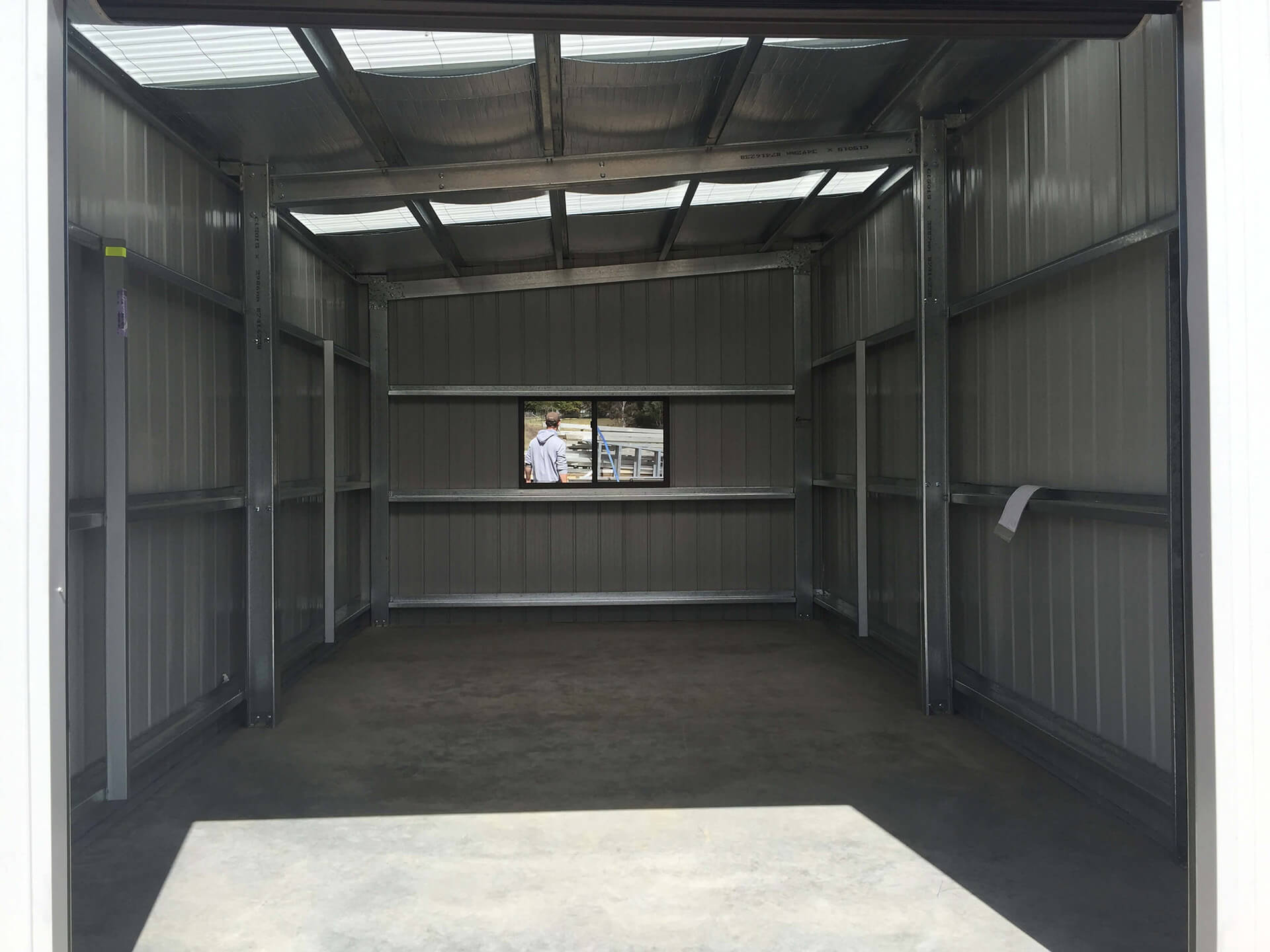 white small 3 door shed with white doors interior  - Snowy Sheds