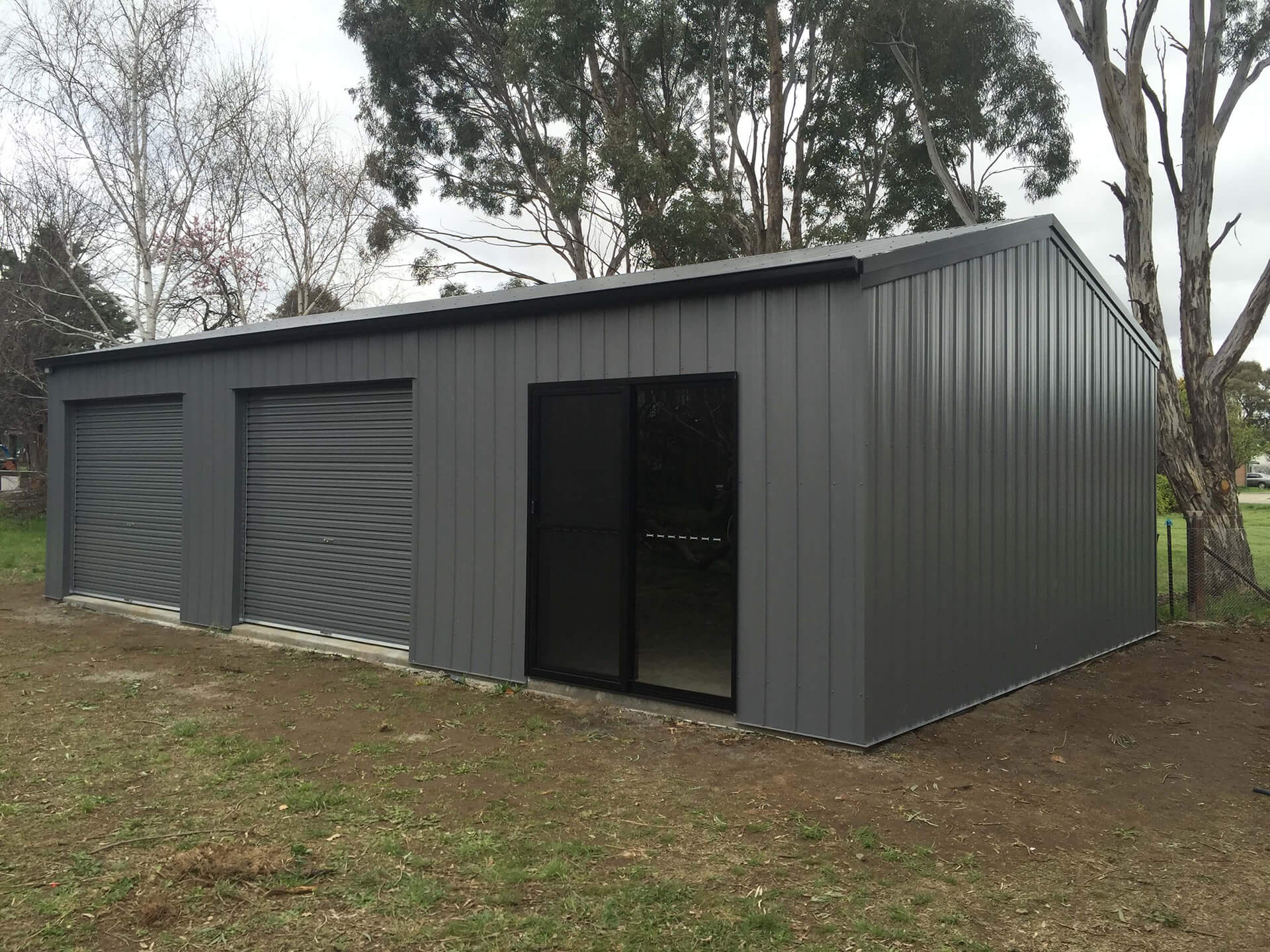 grey shed open door  - Snowy Sheds