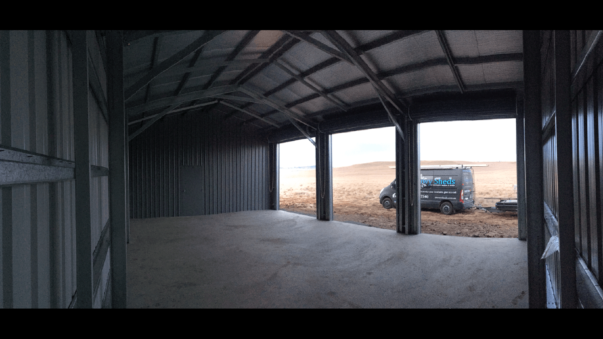 Industrial 3 door white shed interior - Snowy Sheds