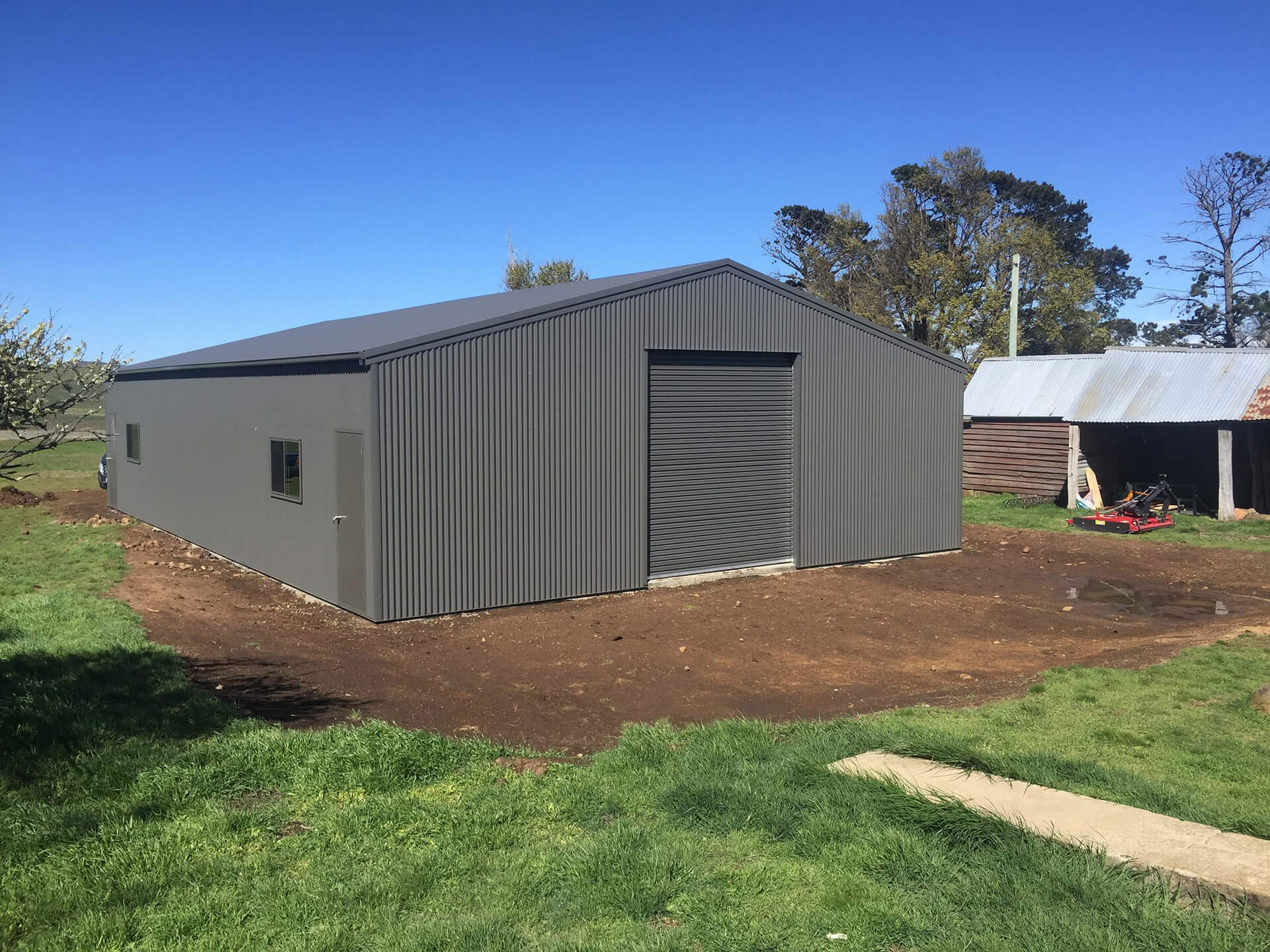Industrial grey shed with grey doors - Snowy Sheds