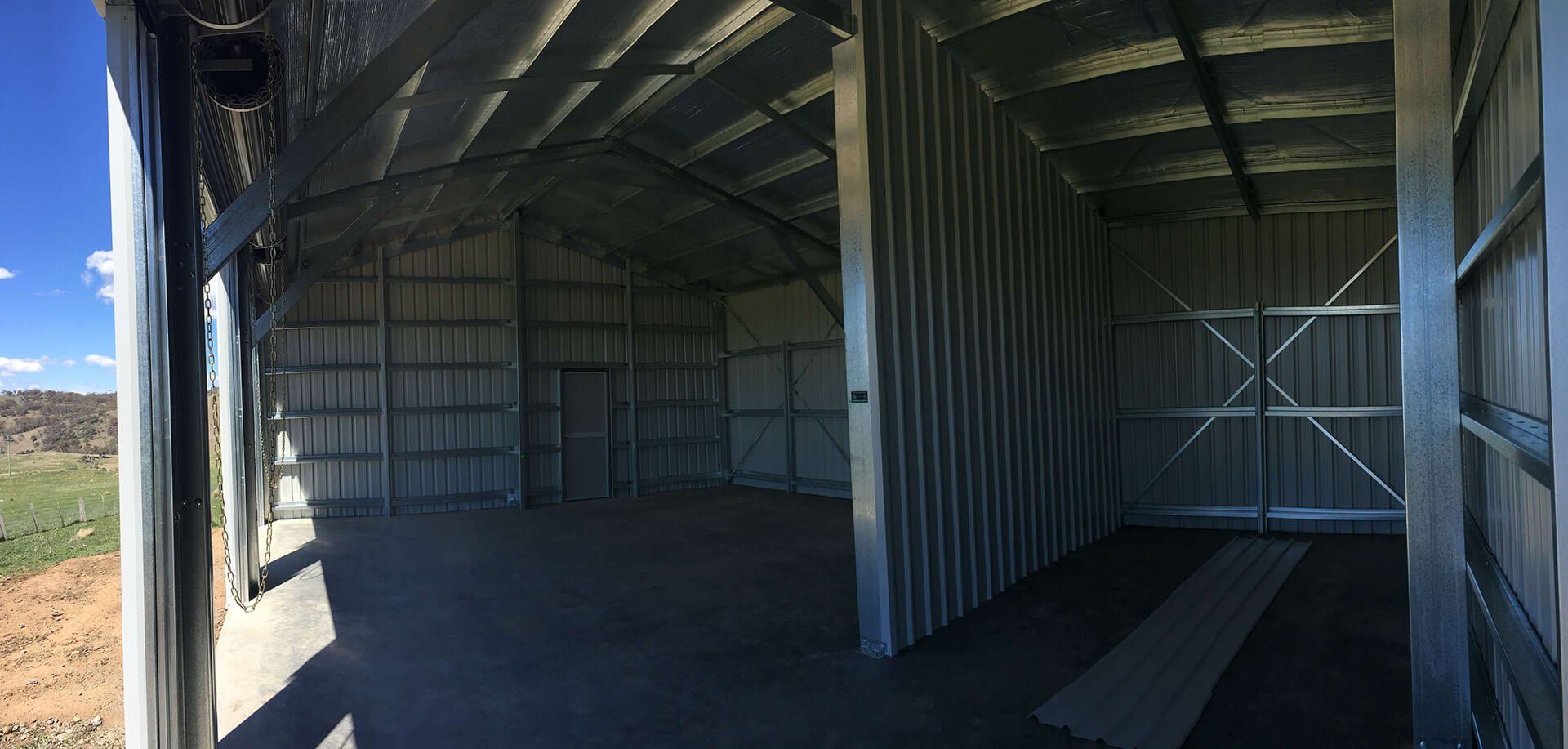 Industrial white shed interior side view - Snowy Sheds