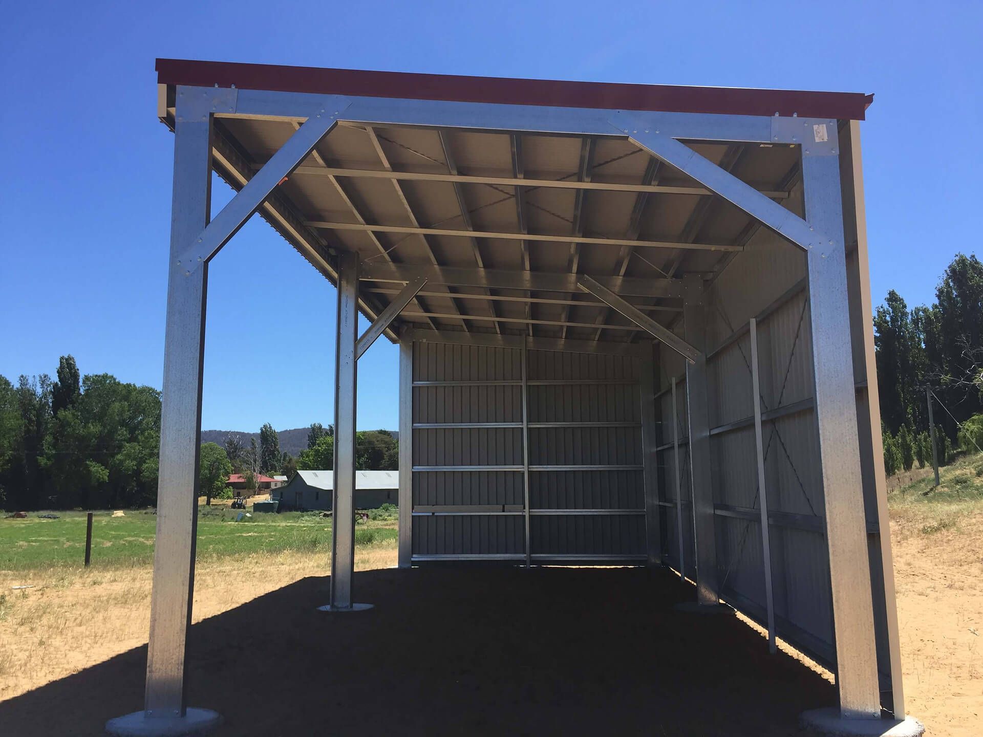 Flat roof Carport attached to house - Snowy Sheds