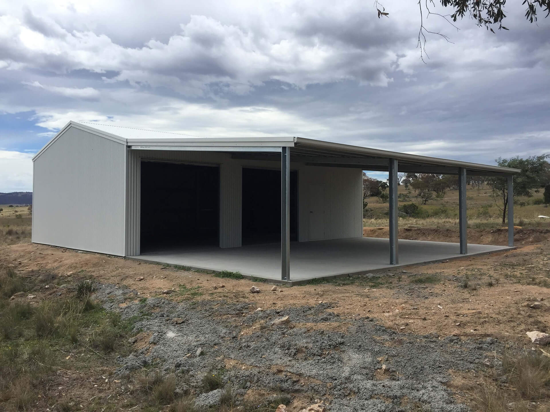 Flat roof Carport attached to house - Snowy Sheds