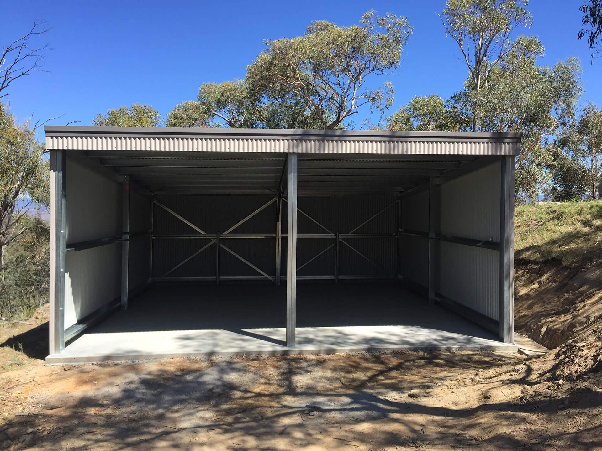 Flat roof Carport attached to house - Snowy Sheds