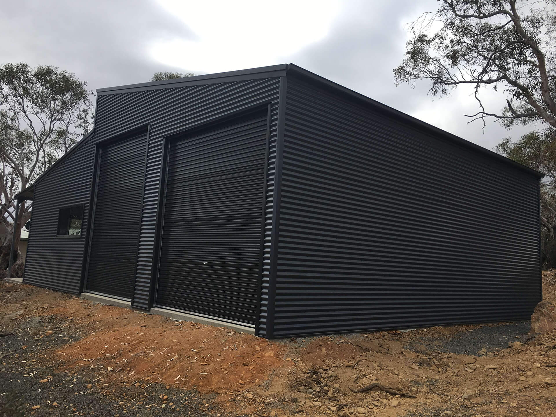 Black 3 door American style barn shed