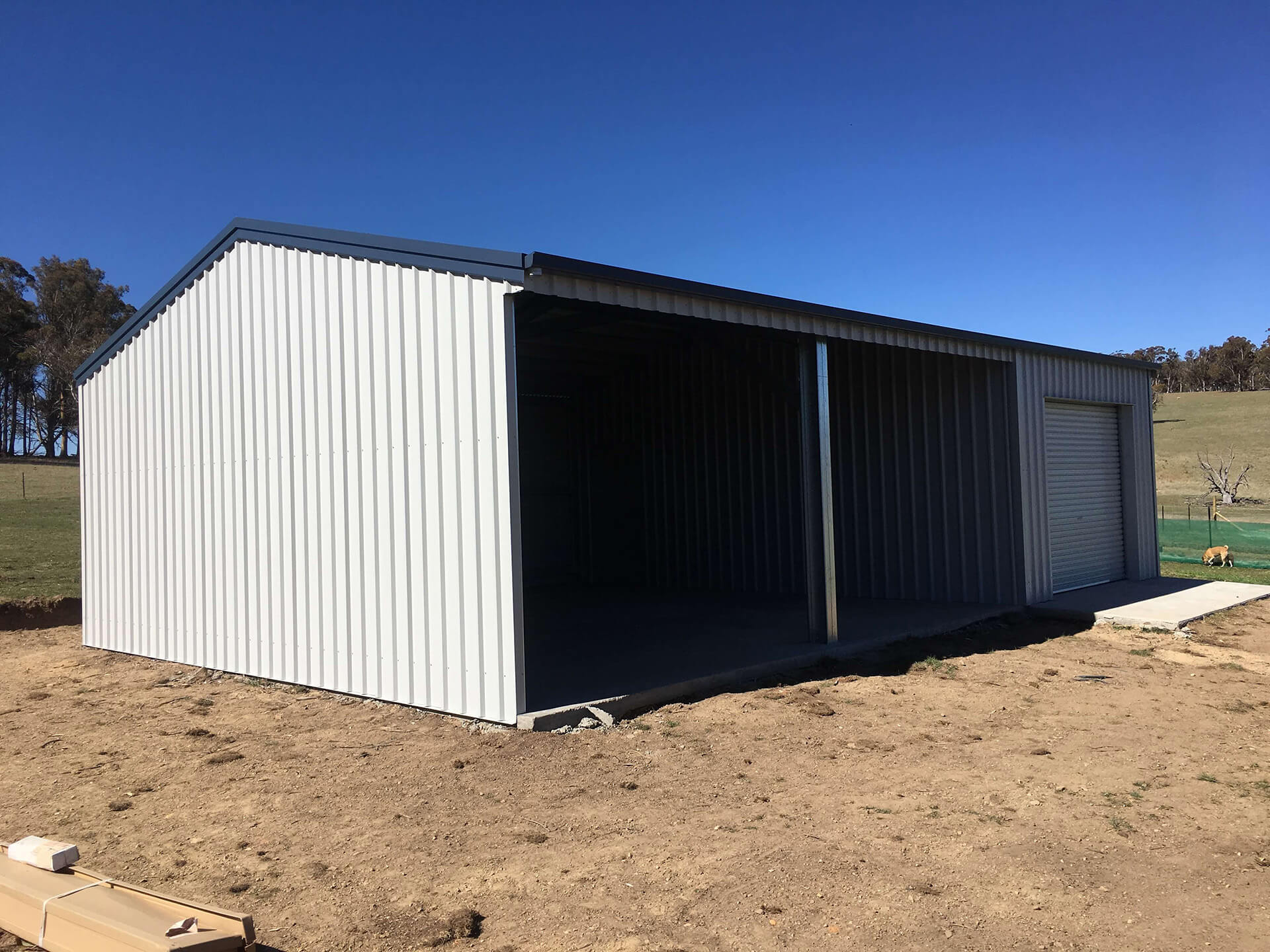 Flat roof Carport attached to house - Snowy Sheds