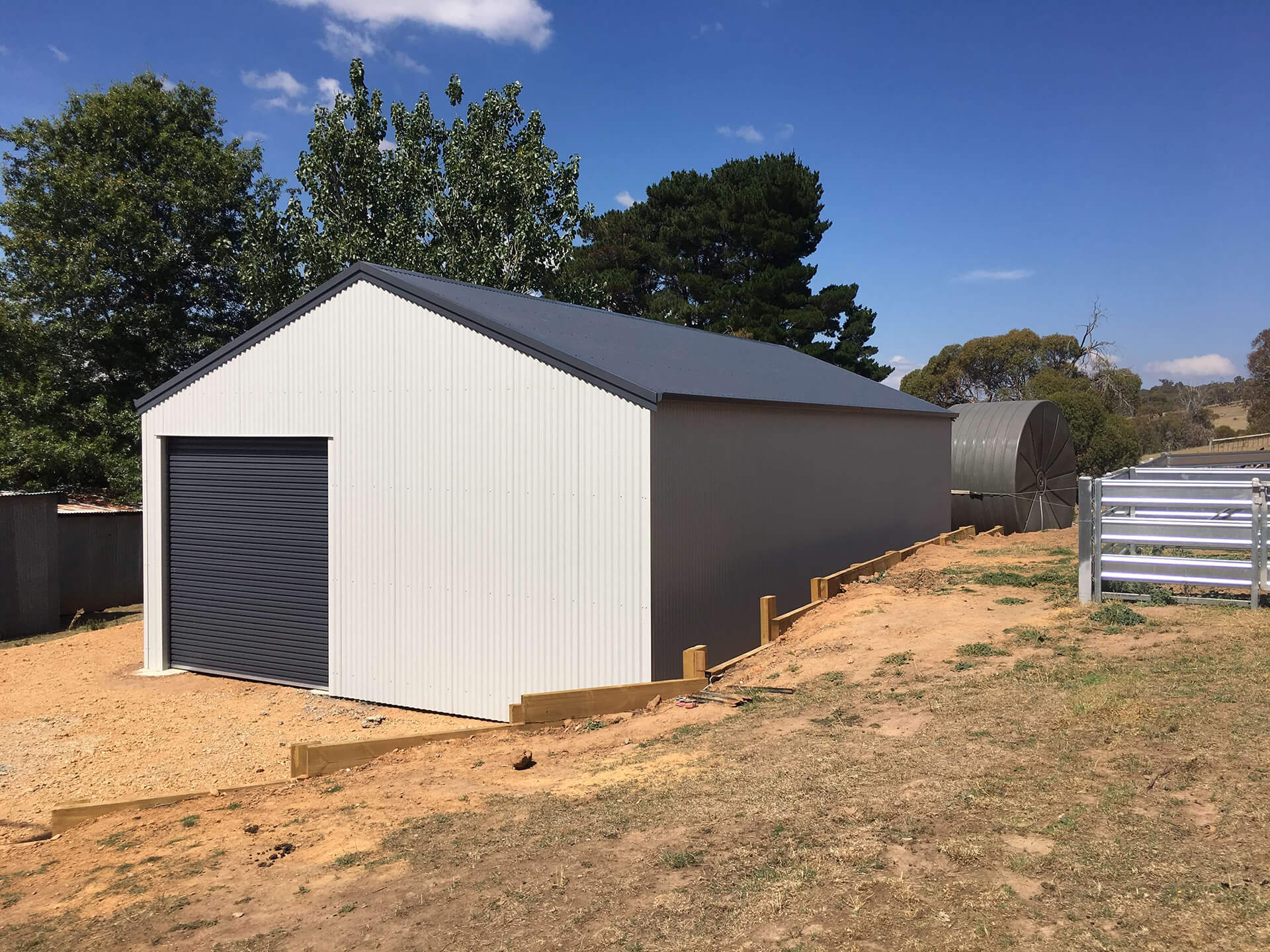 white shed side view  - Snowy Sheds