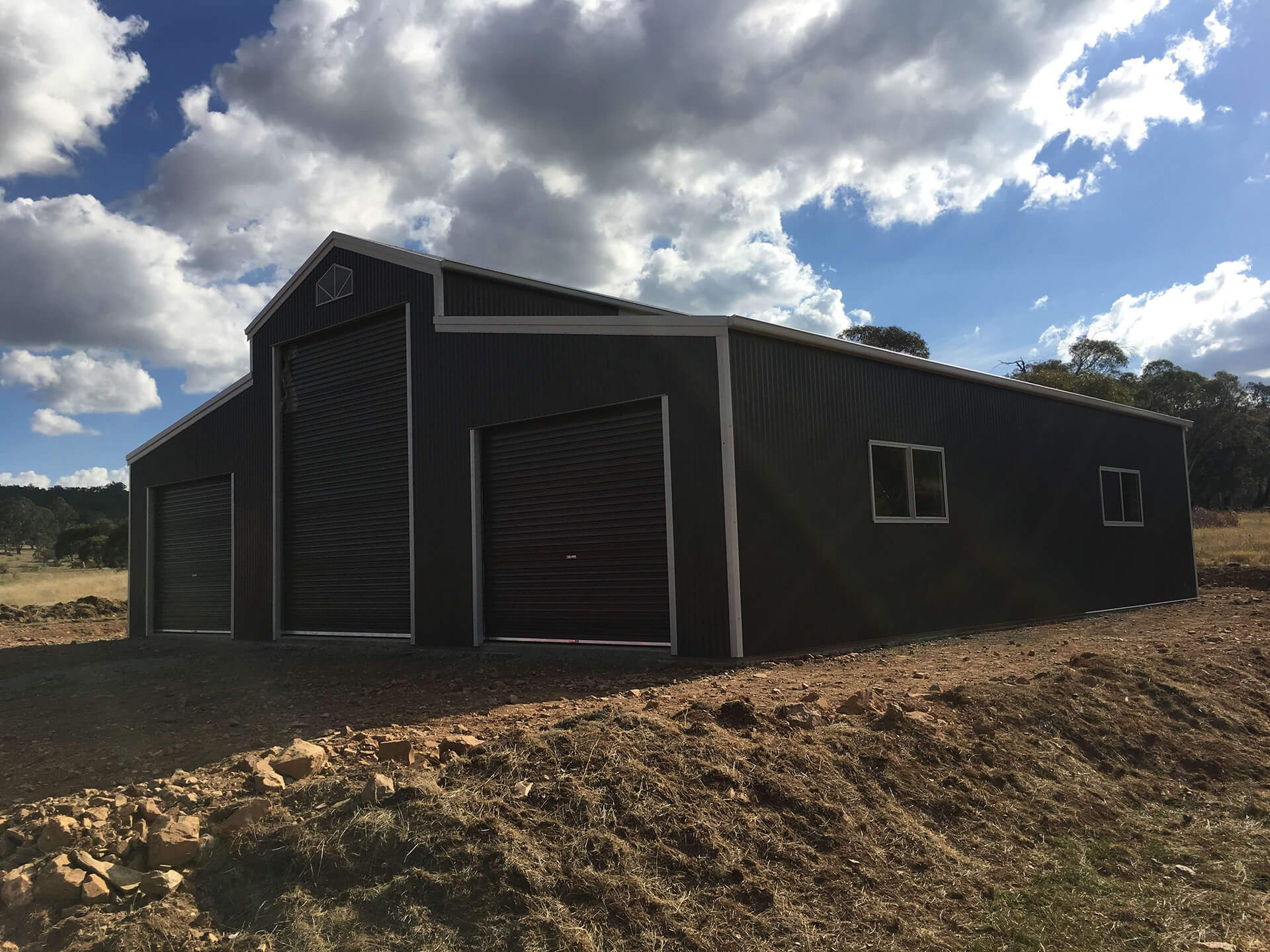 Black 3 door American style barn shed side and back angle front