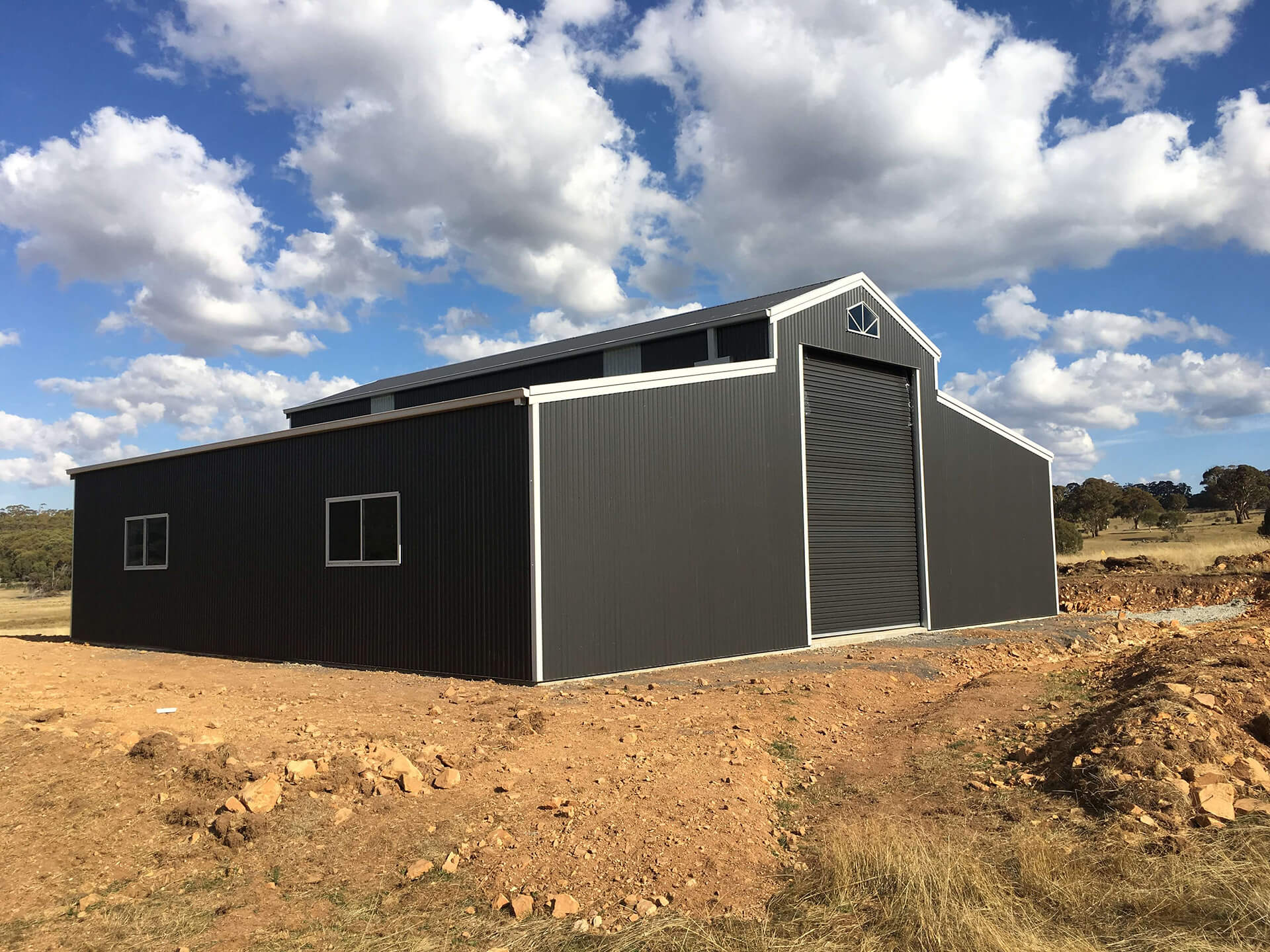 Black 3 door American style barn shed side and back angle
