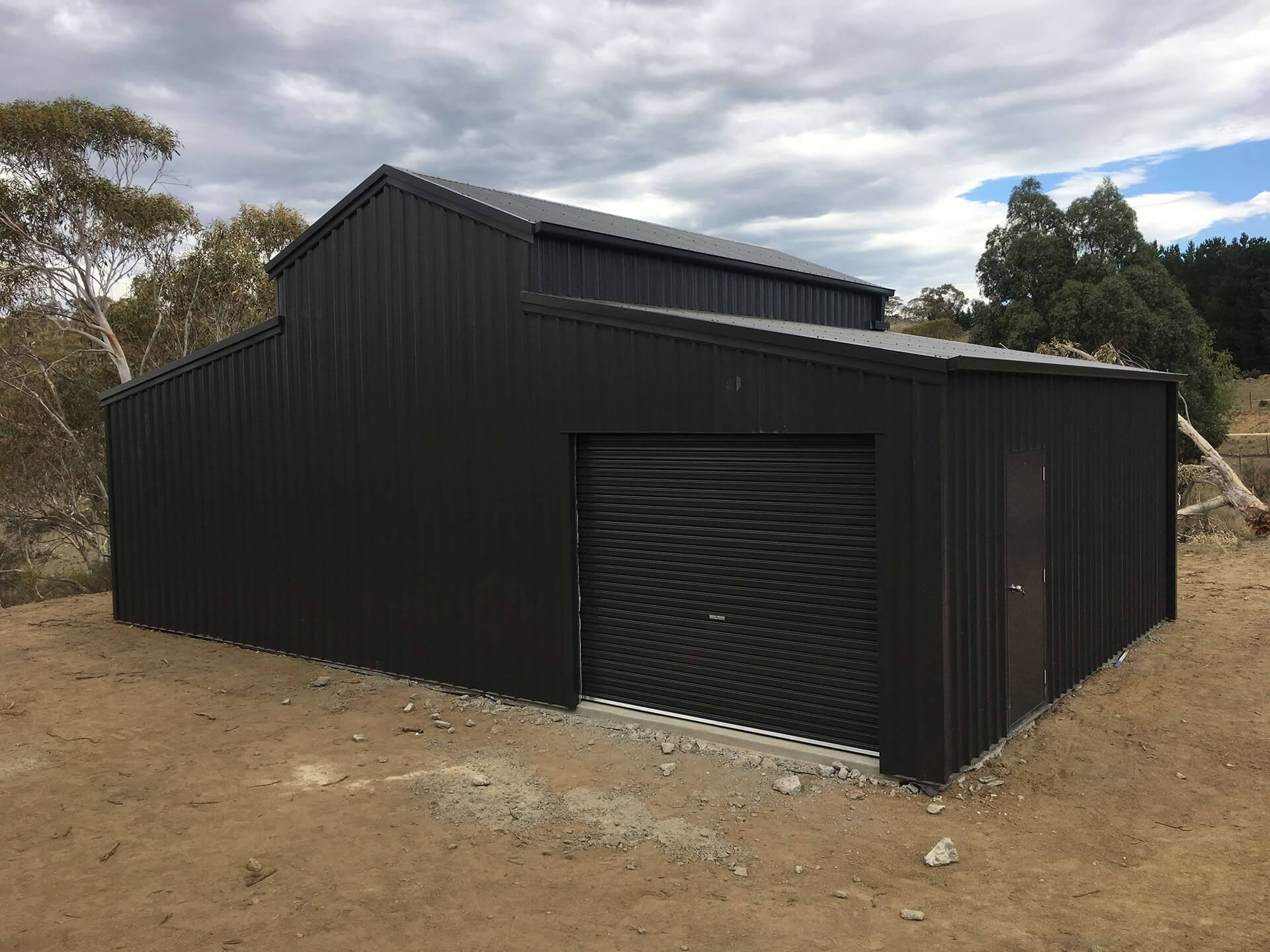 Black 3 door American style barn shed close up