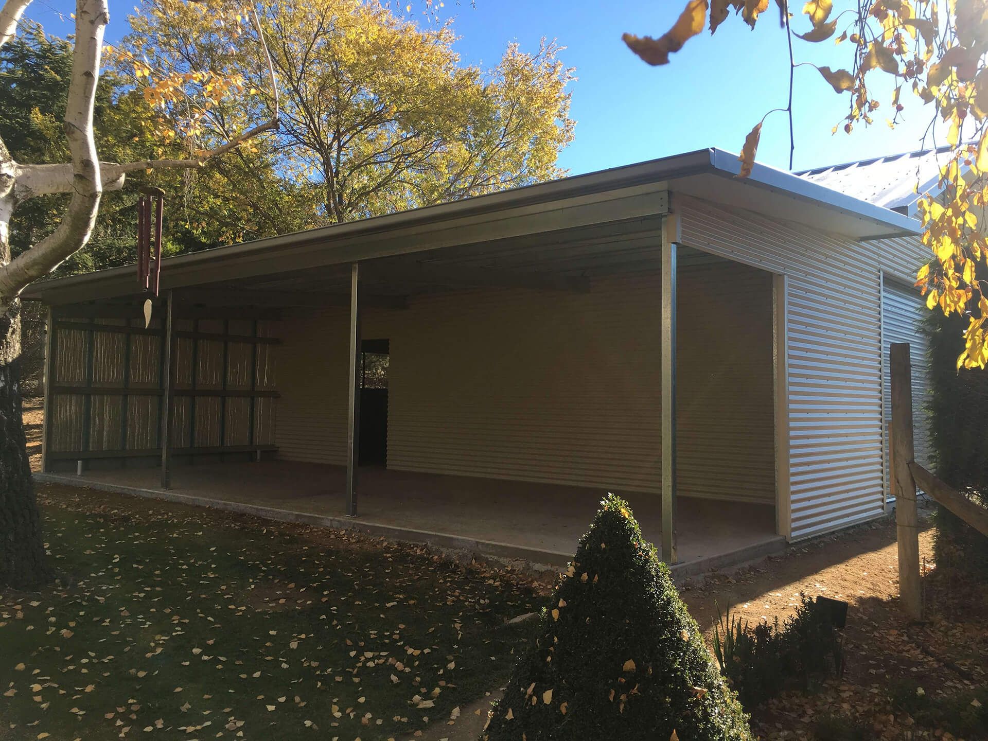 Flat roof Carport attached to house - Snowy Sheds