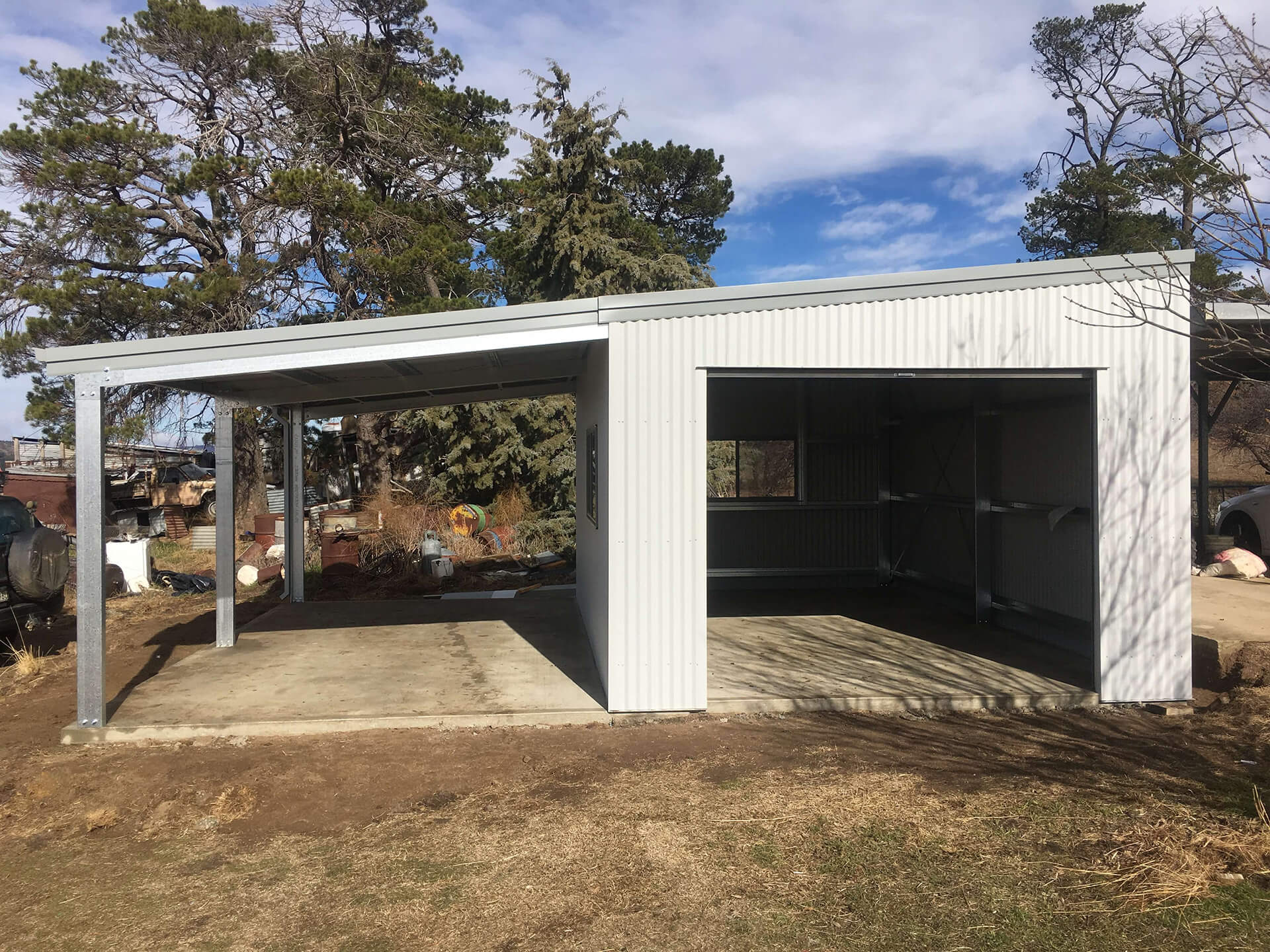 Flat roof Carport attached to house - Snowy Sheds