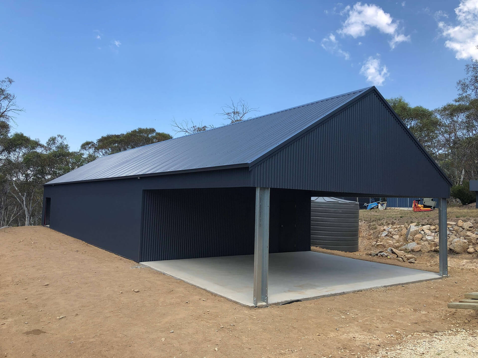 Flat roof Carport attached to house - Snowy Sheds