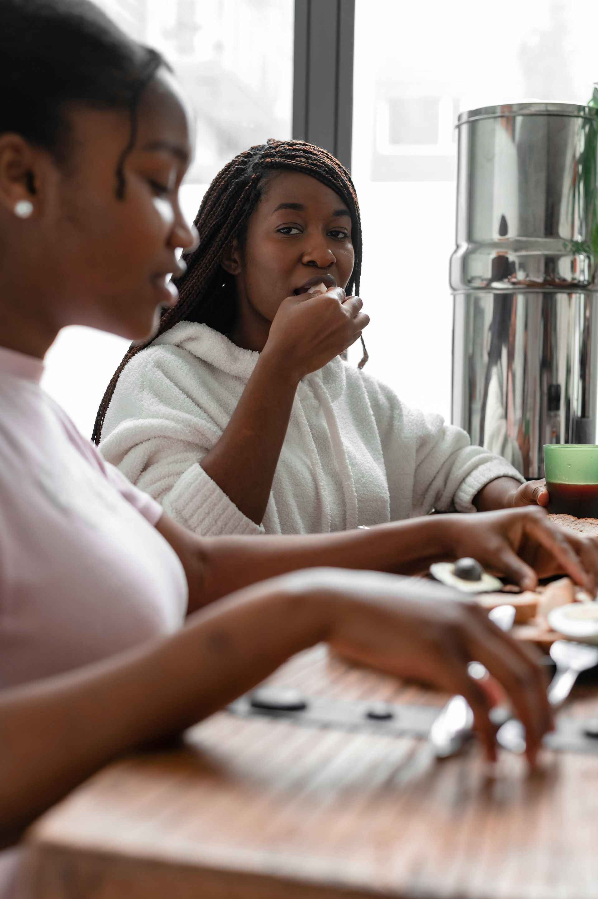 A young woman working with a case manager to build a personalized stability plan at The Shepherd Place