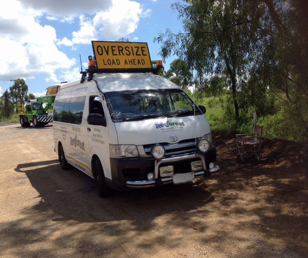 White Van With Sign on Top — Col Adamson Transport Services in Dysart, QLD
