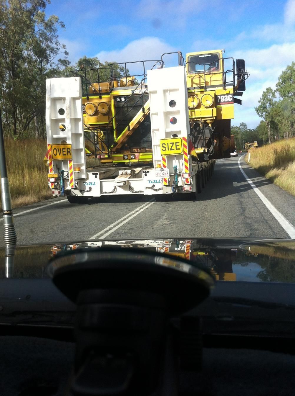 Large Yellow Machinery on a Trailer, Blocking Part of the Road — Col Adamson Transport Services in Farleigh, QLD