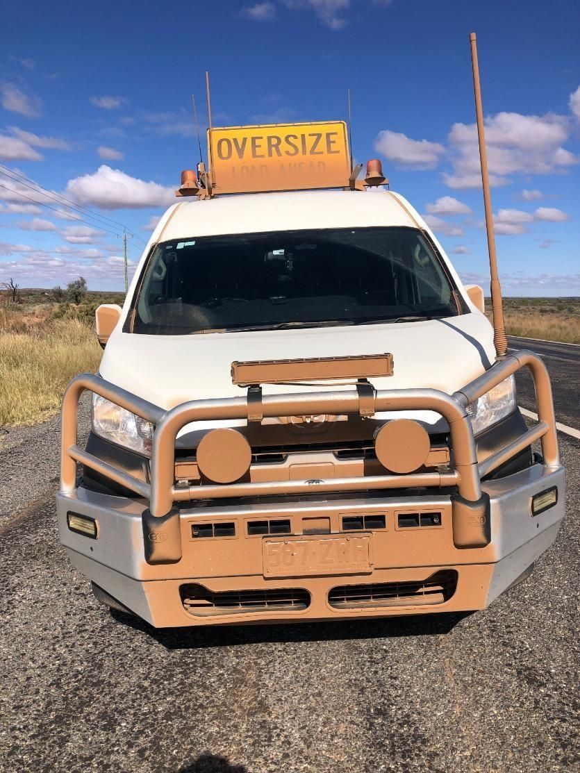 White Vehicle With Bull Bar on Road — Col Adamson Transport Services in Farleigh, QLD
