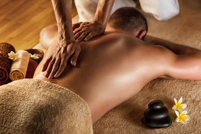 man getting a deep tissue back massage