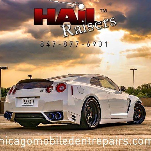 White modified sports car at sunset with 