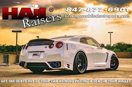 White sports car in a sunset parking lot with hail damage repair service text and phone number banner