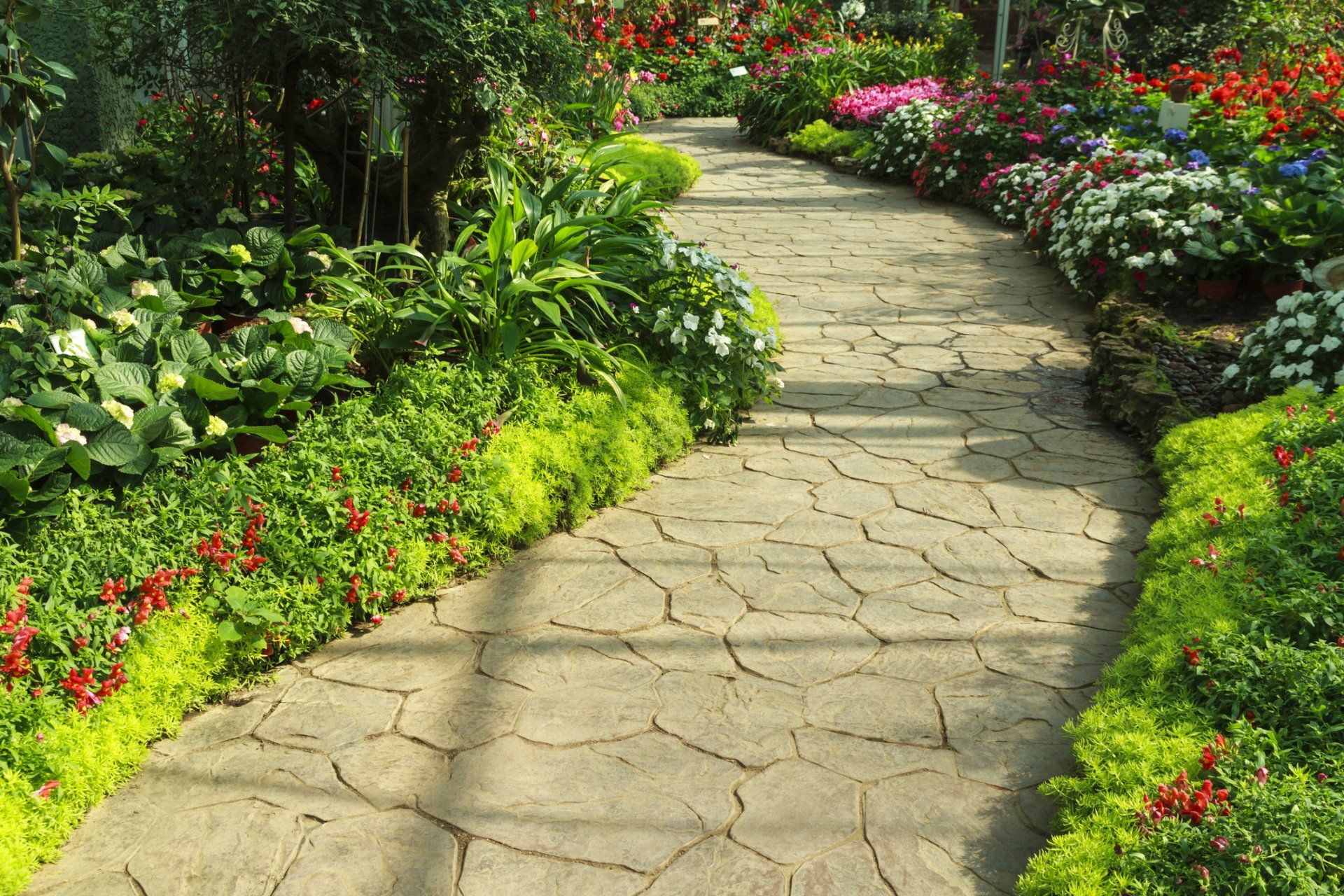 Stone Walkway in Flower Garden — Wilmington, DE — Paradise Landscaping