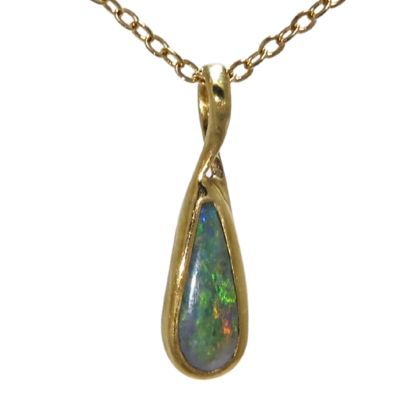 A gold teardrop-shaped pendant featuring an iridescent dark opal stone, suspended on a fine gold chain.