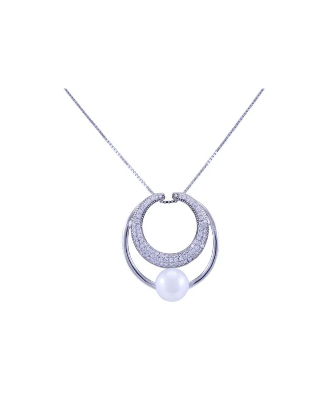 A silver necklace featuring a sparkling, pave-set crescent moon pendant suspended above a single white pearl.