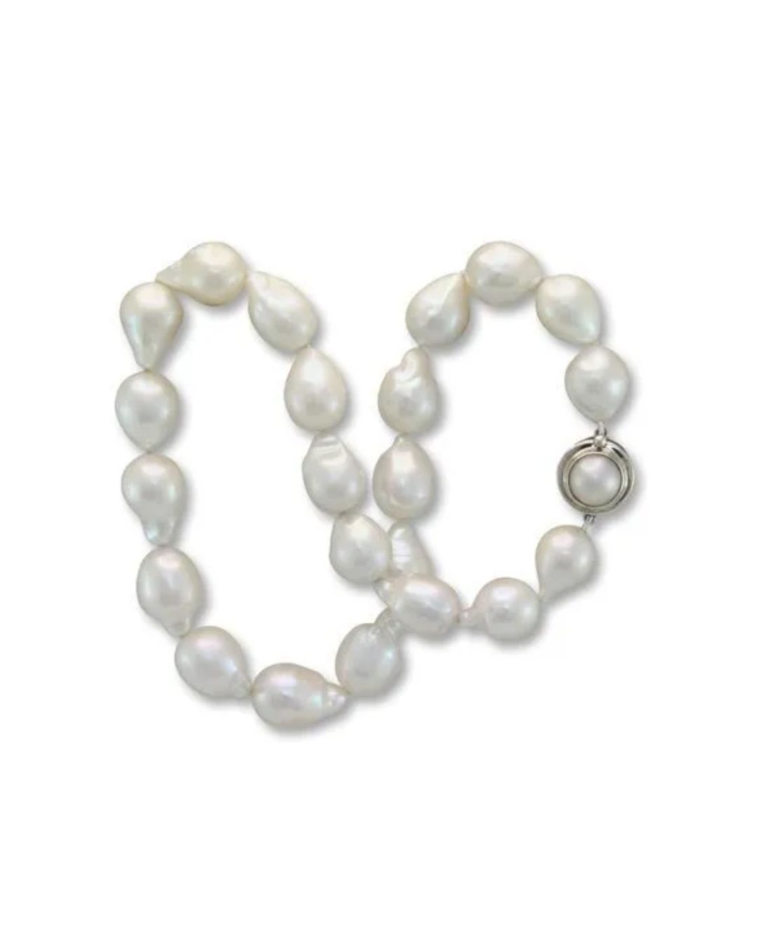 A strand of lustrous, irregular white baroque pearls with a decorative silver circular clasp.