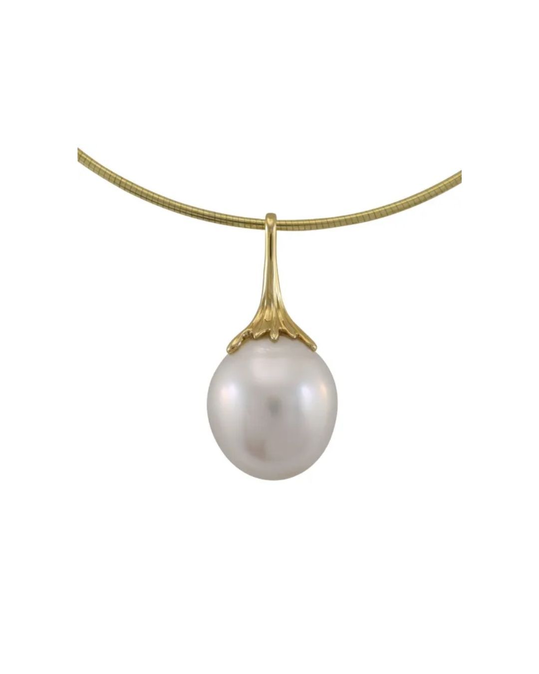 A white pearl pendant held by a gold filigree bail on a thin gold snake chain against a white background.