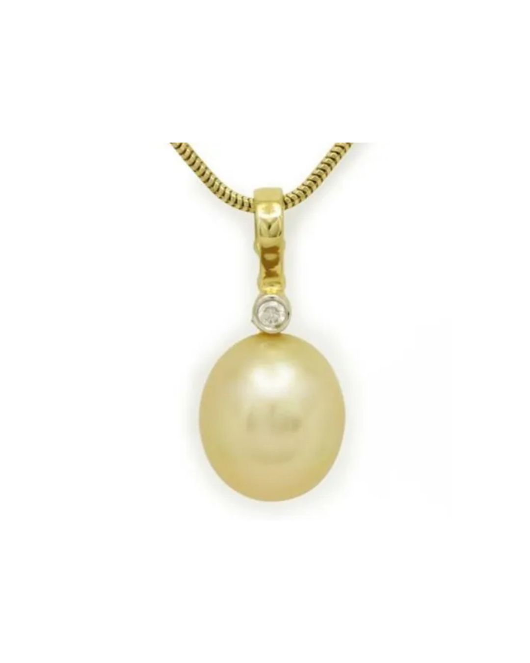 A gold chain necklace with a pendant featuring a small diamond above a large, round, golden-colored pearl.