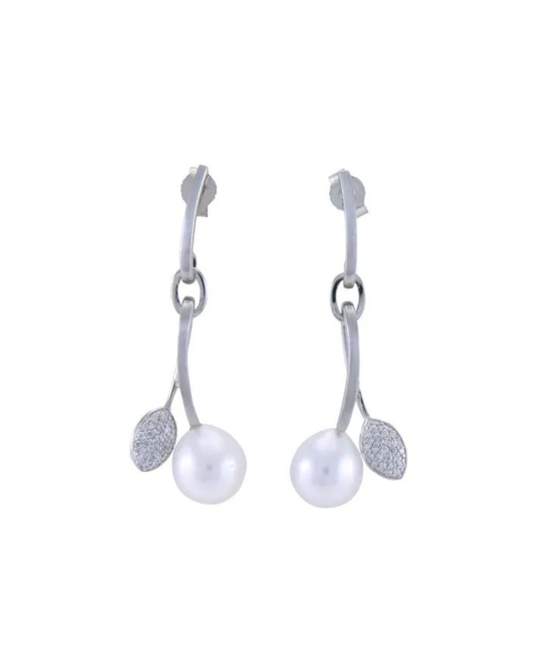 A pair of silver drop earrings featuring a pearl and a small, textured leaf charm hanging from a linked bar.