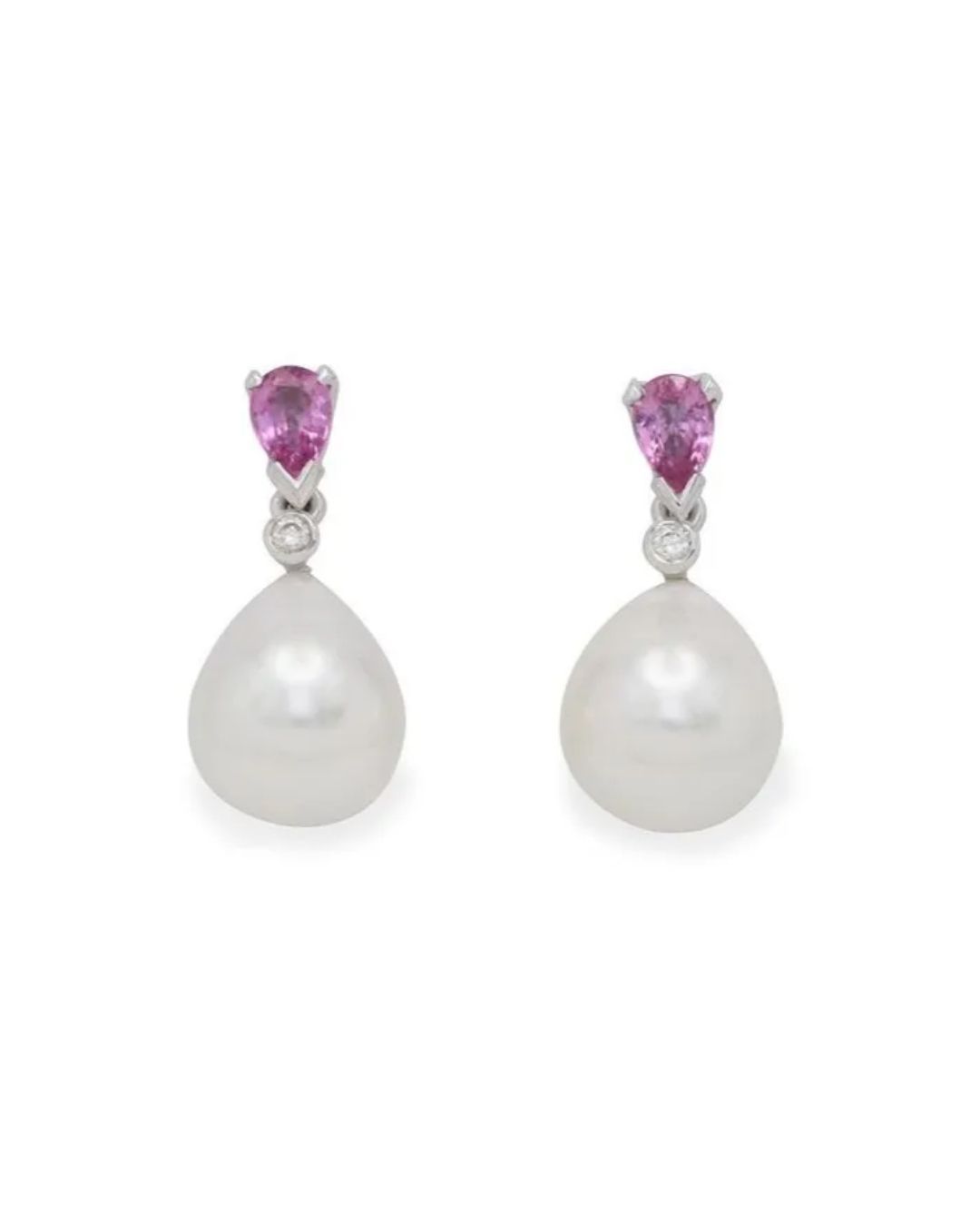 A pair of drop earrings featuring teardrop-shaped white pearls, each topped with a small diamond and a pink sapphire.