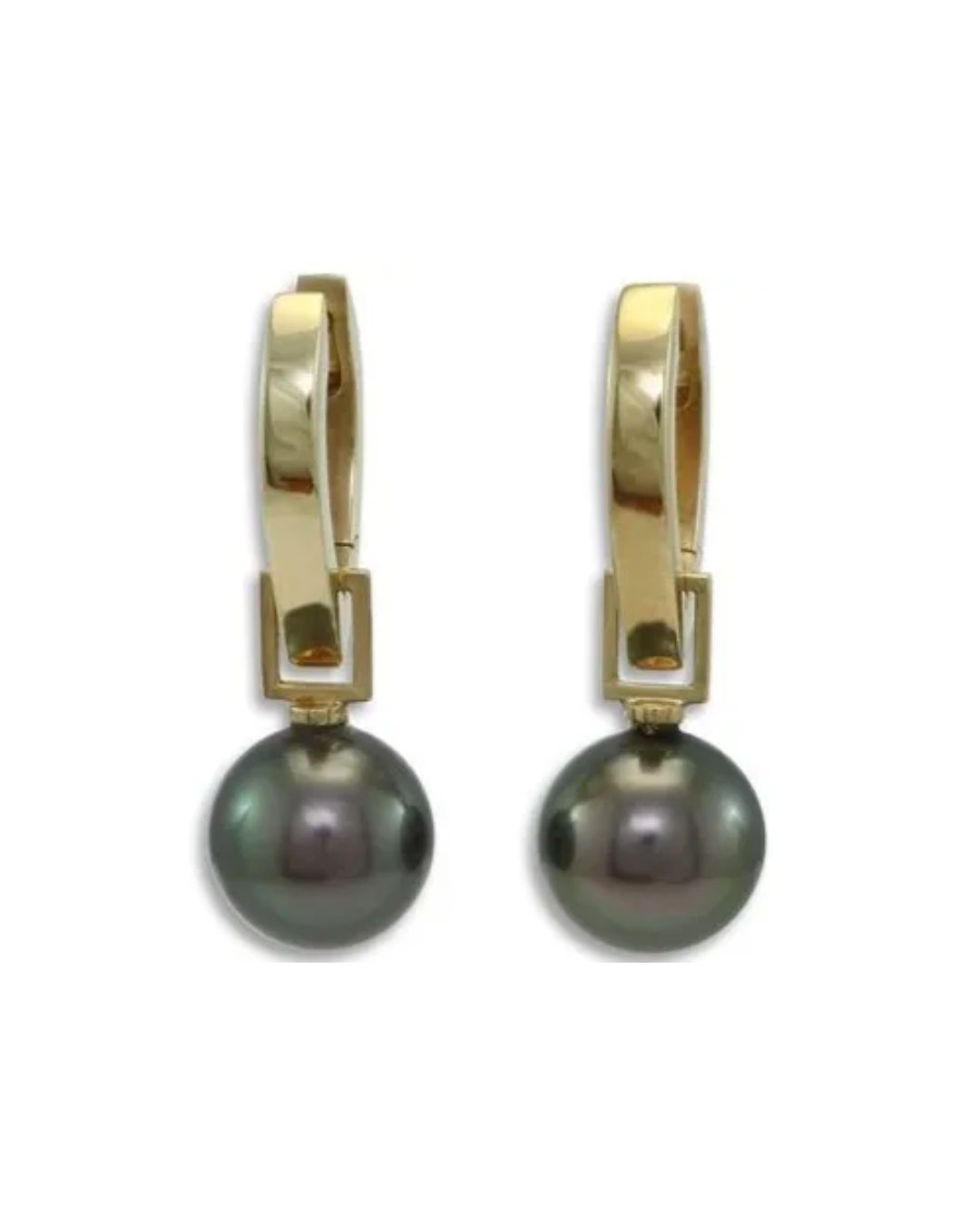 A pair of dangling earrings featuring dark, spherical pearls suspended from polished gold hinged hoops.