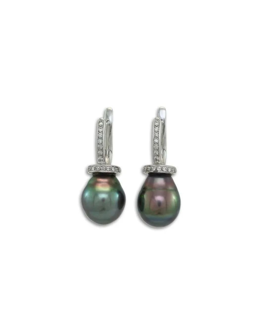 A pair of drop earrings featuring dark iridescent pearls hanging from silver, diamond-encrusted hooks against a white.