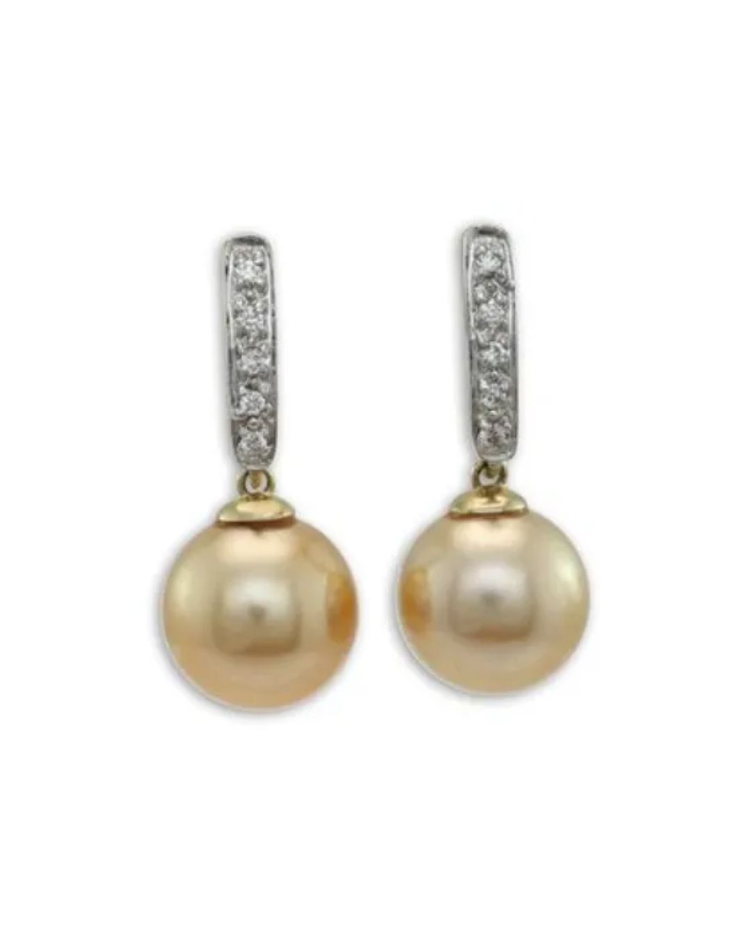 A pair of drop earrings featuring round, golden South Sea pearls suspended from silver hoops encrusted with small diamonds.